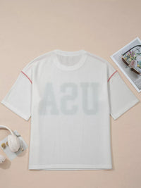 White textured t-shirt on a beige background
