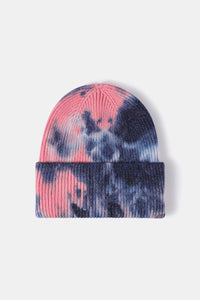 Tie-dye beanie with pink and blue pattern on a white background