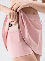 View of pocket on pink High Waist Active Skort with Pockets
