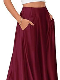 Burgundy skirt worn by a person on a white background
