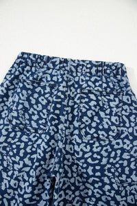 Blue leopard print pants on a white background