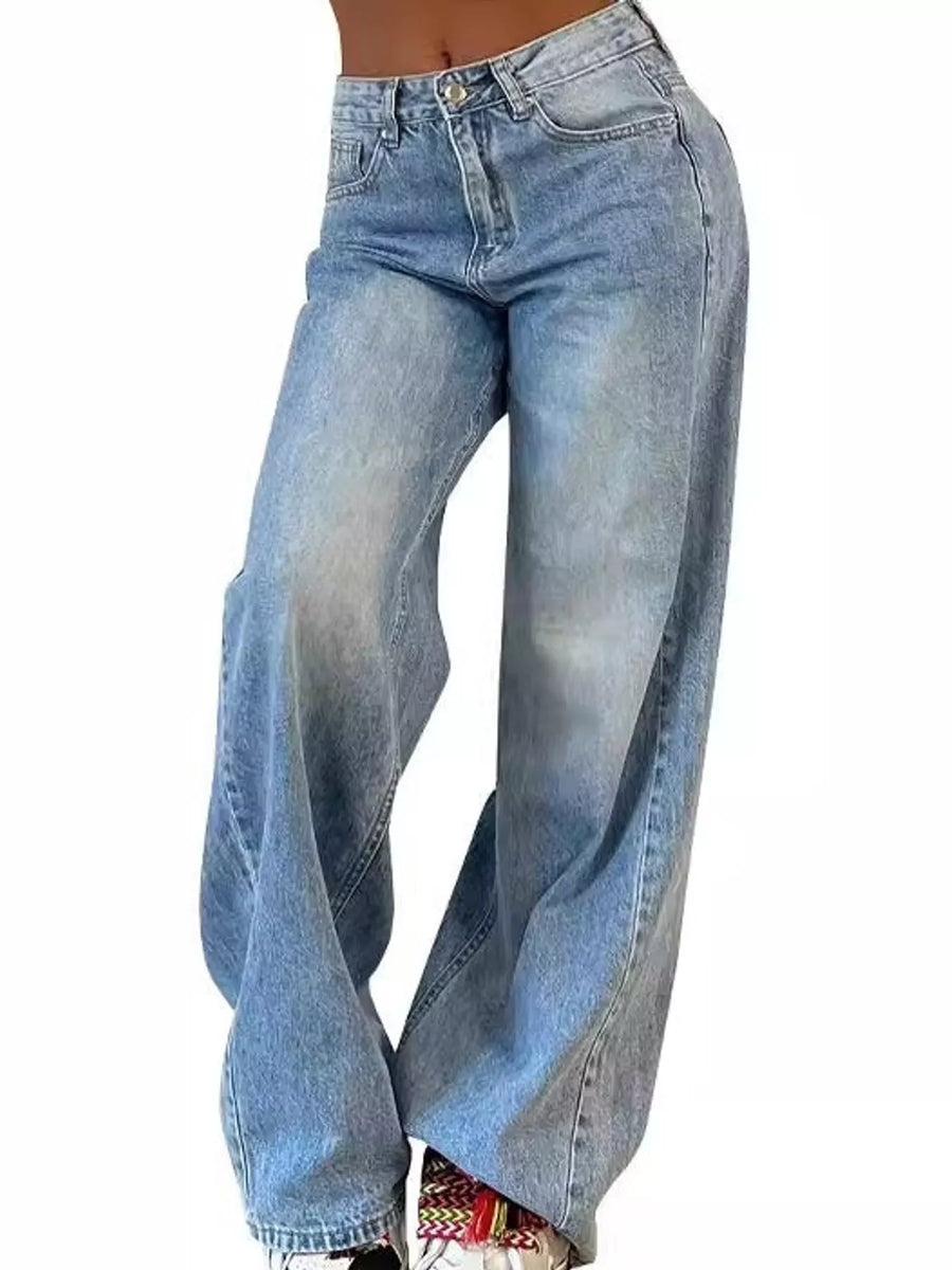 Light blue wide-leg denim jeans with a faded wash, shown on a model from the waist down against a plain white background.