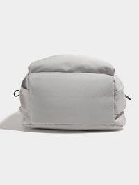 Gray backpack on a white background