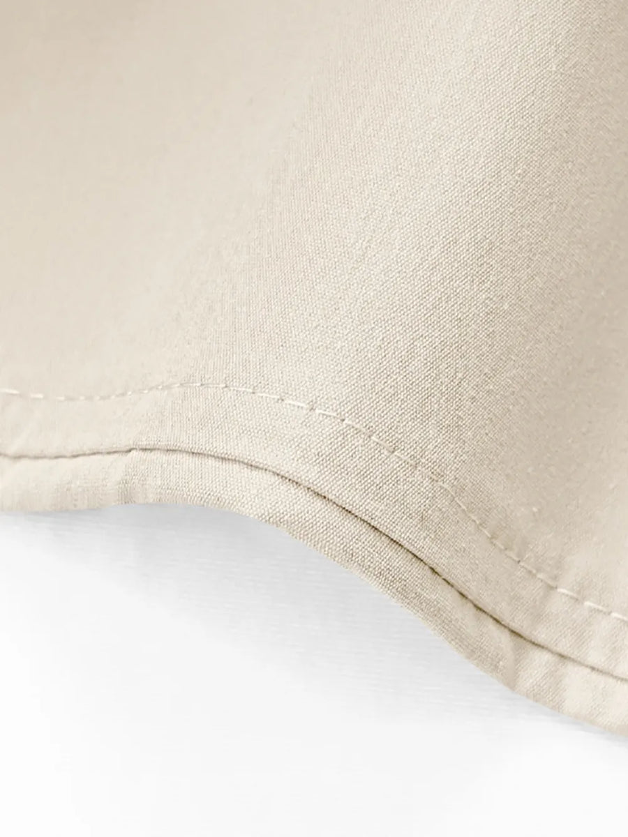 Close-up of beige fabric on a white background