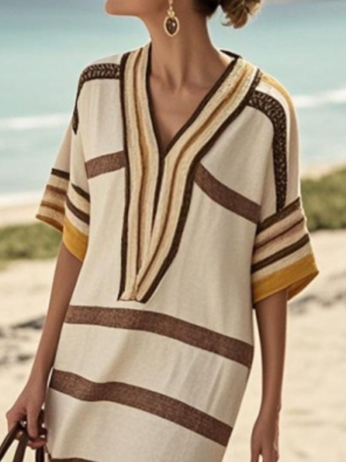 Close up brown and beige striped dress