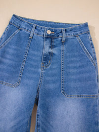 Blue jeans on a beige background