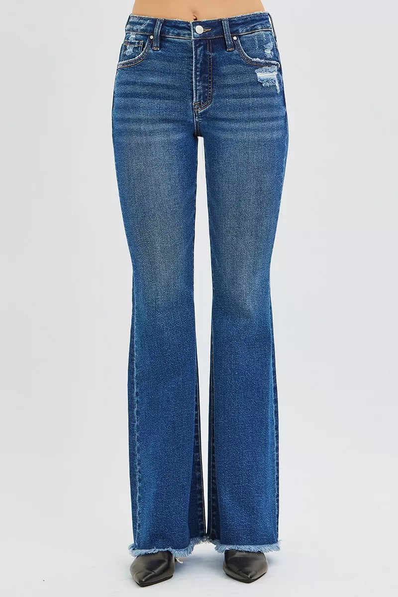 Blue flared jeans on a white background