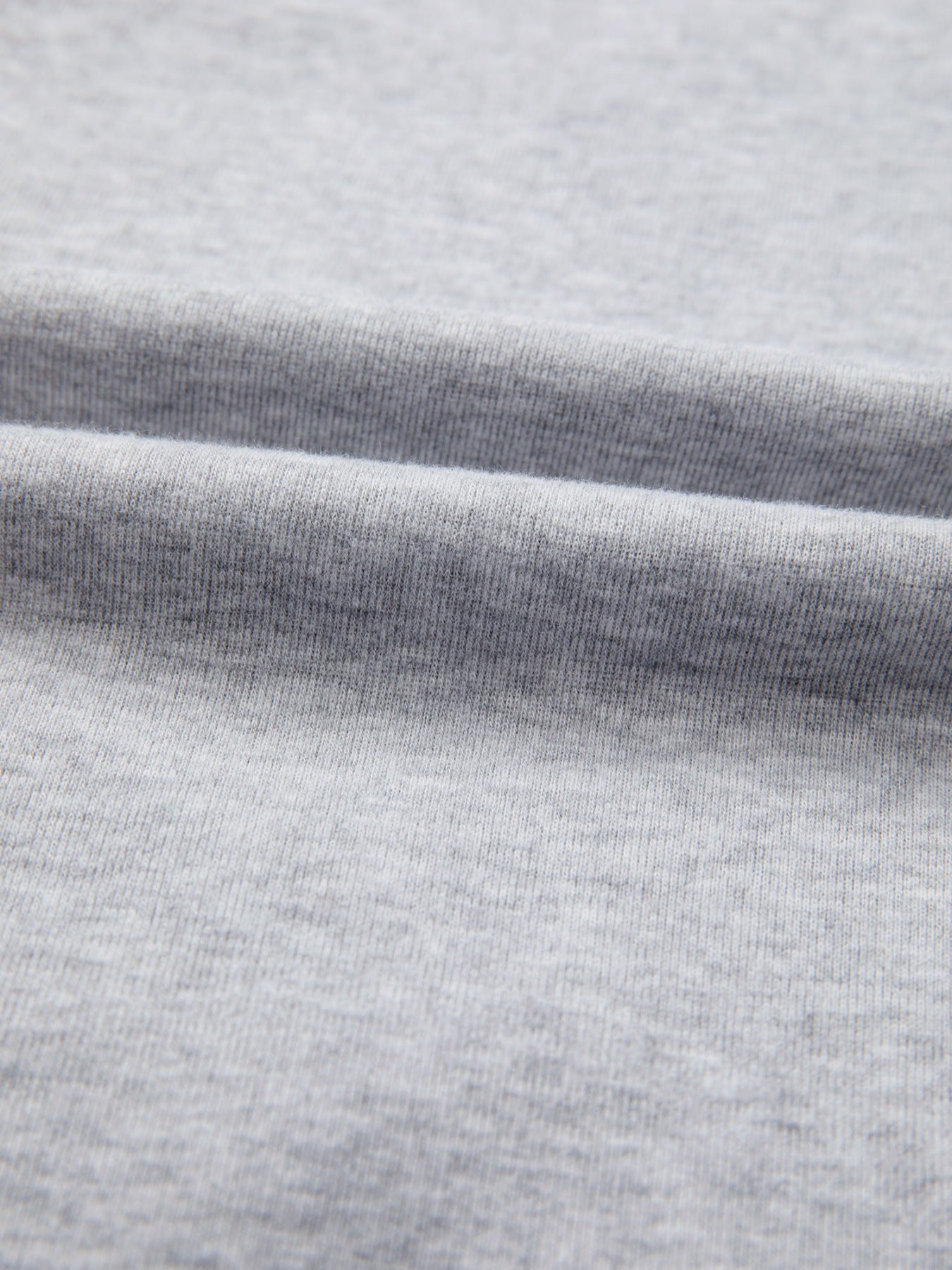 Close-up of gray fabric with a subtle texture