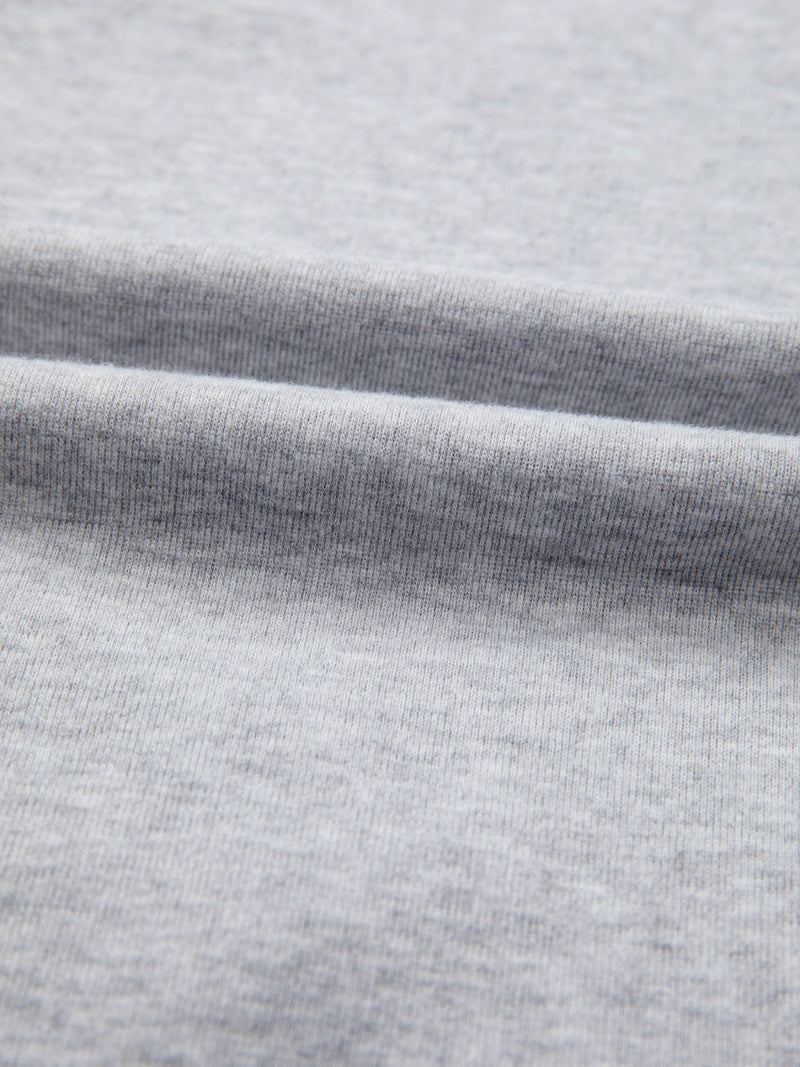 Close-up of gray fabric with a subtle texture