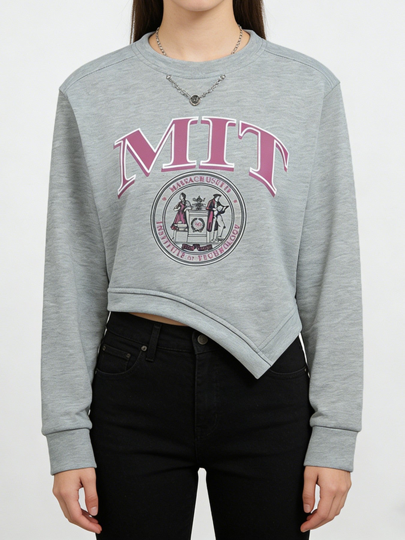 Gray sweatshirt with MIT logo worn by a person on a white background