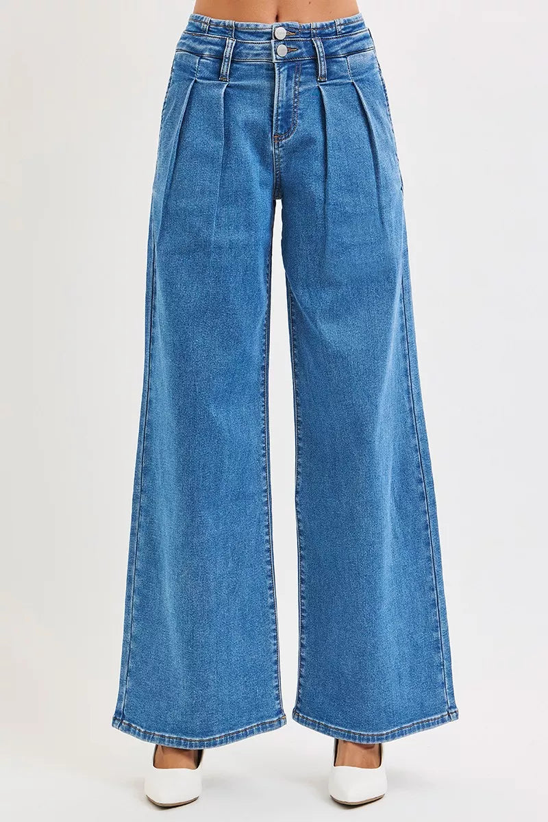 Blue wide-leg jeans on a white background