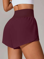 Maroon athletic skirt worn by a person on a plain background