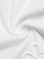 Close-up of white fabric with a subtle texture