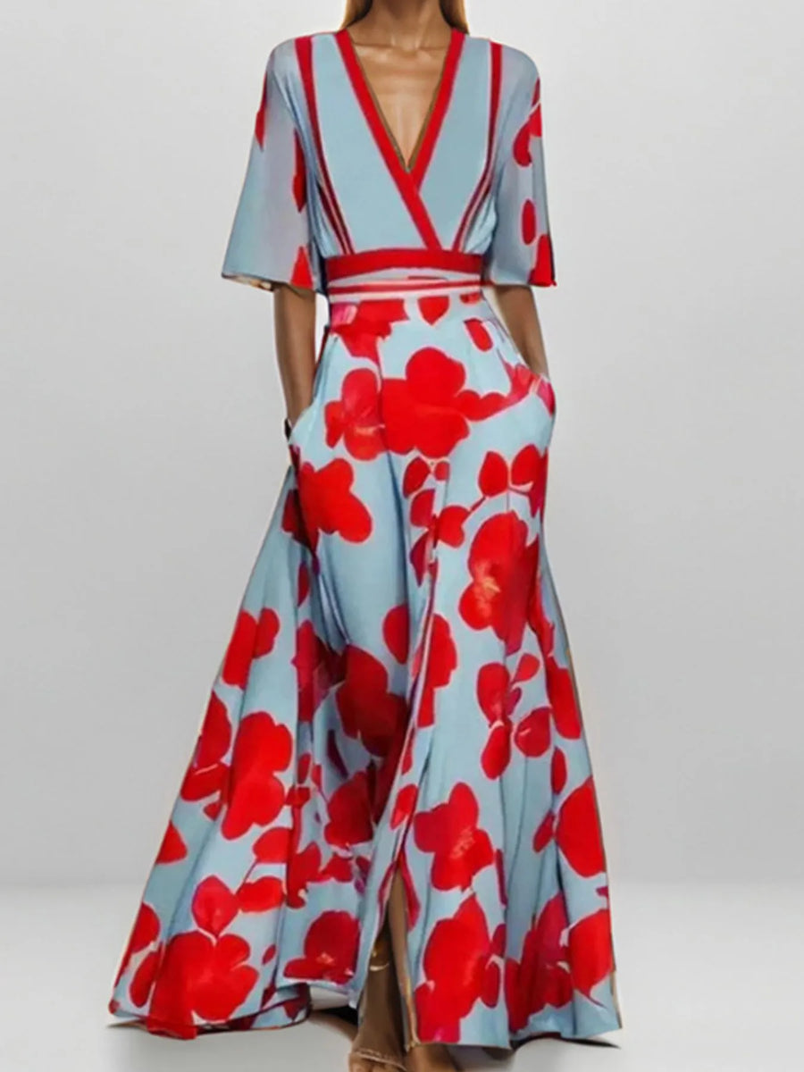 Woman wearing a floral dress with red flowers on a light blue background