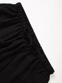 Black fabric with ruched texture on a white background