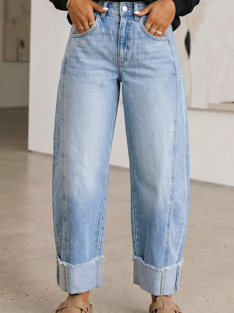 Woman has her hands in the pocket of Cuffed Wide-Leg Jeans 