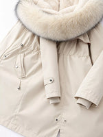 A back view of Women's Detachable Longline Hooded Parka with Faux Fur Trim and Drawstring Waist