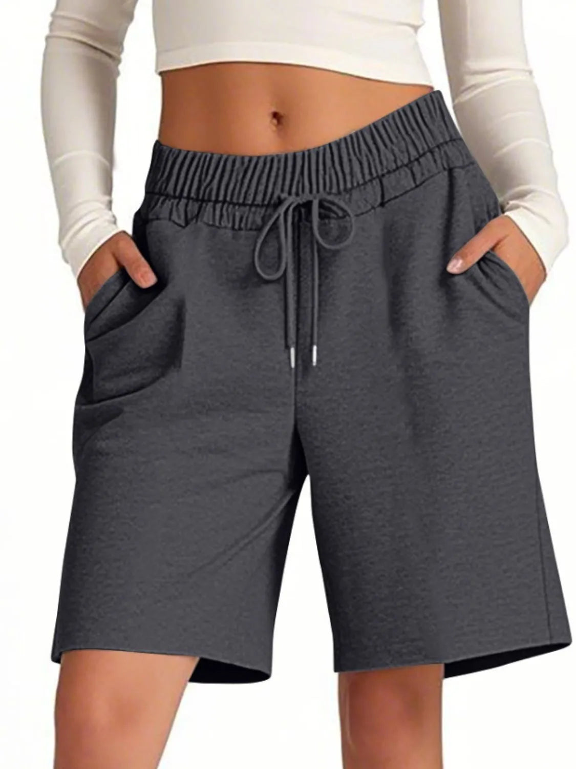 Gray shorts with drawstring waist on a white background