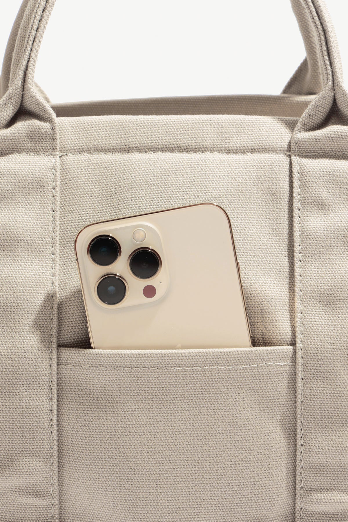 cell phone pocket of the Sloane Tote - Taupe