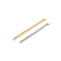 A full view of gold and silver B.Tiff Pavé High Polish Flat Angular Cuban Link Bracelet