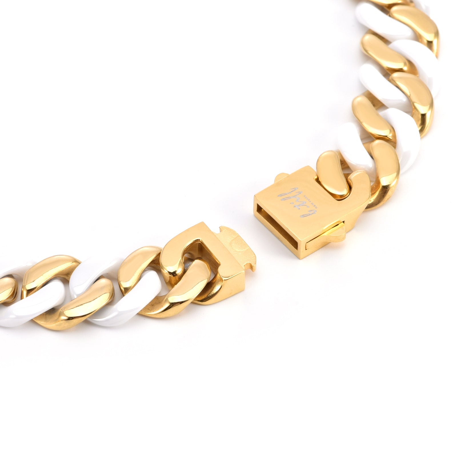 A view of the latch on B.Tiff 16mm 2-Tone Gold Plated White Ceramic Flat Cuban Link Necklace