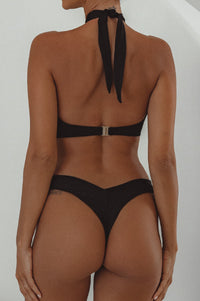 Back view of black Capri Bikini Bottoms 