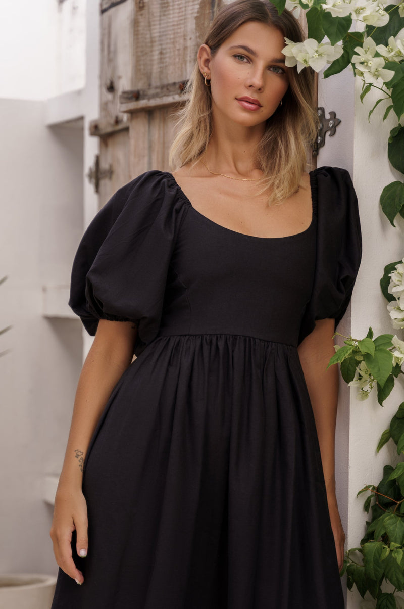 Model showing the top of Cherie Puff Sleeve Midi Dress