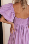 Zoom in view of the sleeve on the purple Cherie Puff Sleeve Midi Dress