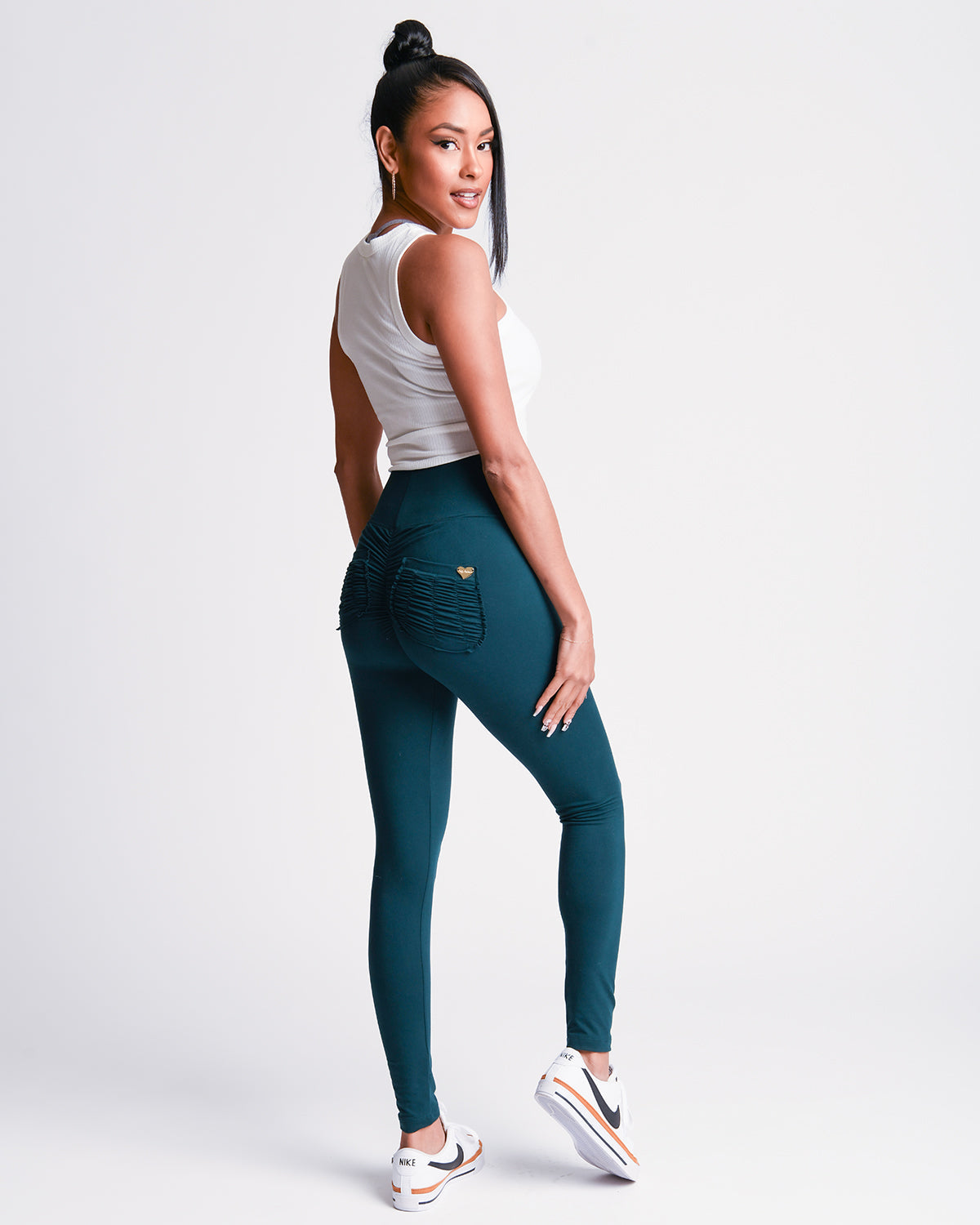 Another back view of green *Soft Sculpt* (Yoga Brush Leggings)