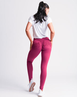 Zoom in view of the back of pink *Soft Sculpt* (Yoga Brush Leggings)