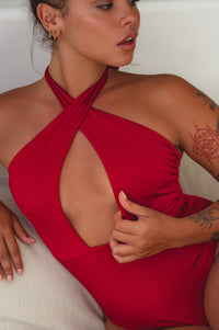 woman posing in red Iliana Cross-Over One Piece Swimsuit 