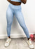 Standing pose of  a model wearing Checkered High Rise 7/8 Leggings-light blue