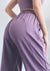 close up of the back of purple High Rise Contouring Seam Drawstring Ruched Joggers