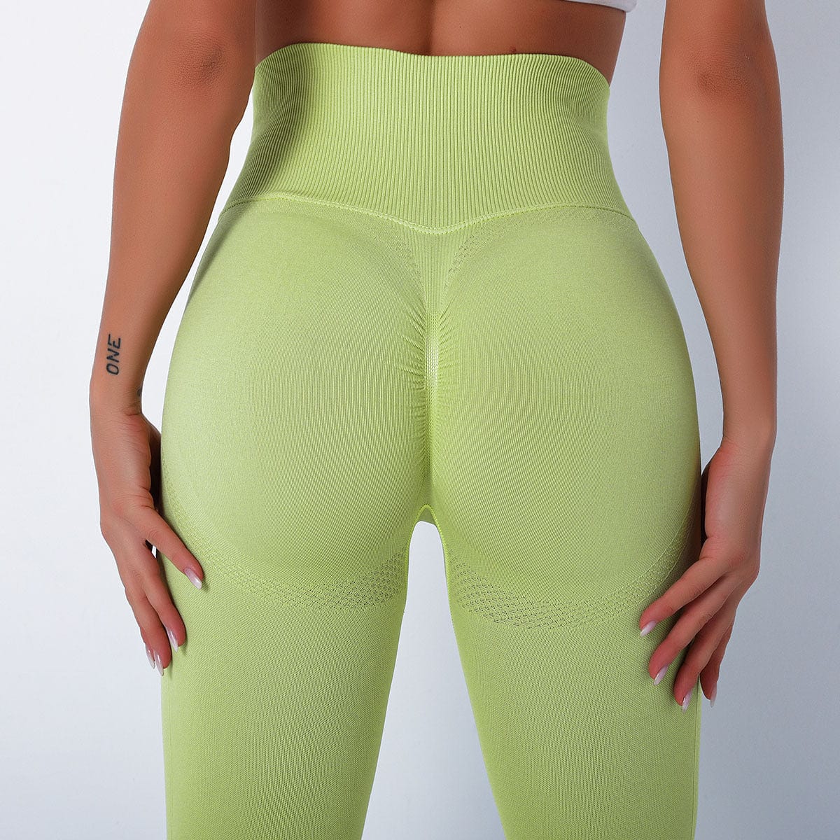 Zoom in view of Butt Sculpting High Rise Leggings-lime green