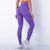 Model showing the back of the purple leggings
