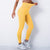 Model shows how flexible the leggings are -yellow