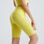 Left side view of yellow biker shorts