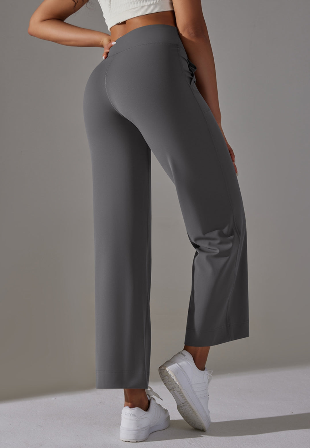 Model showing view from the back of Tie Waist Straight Leg Pants