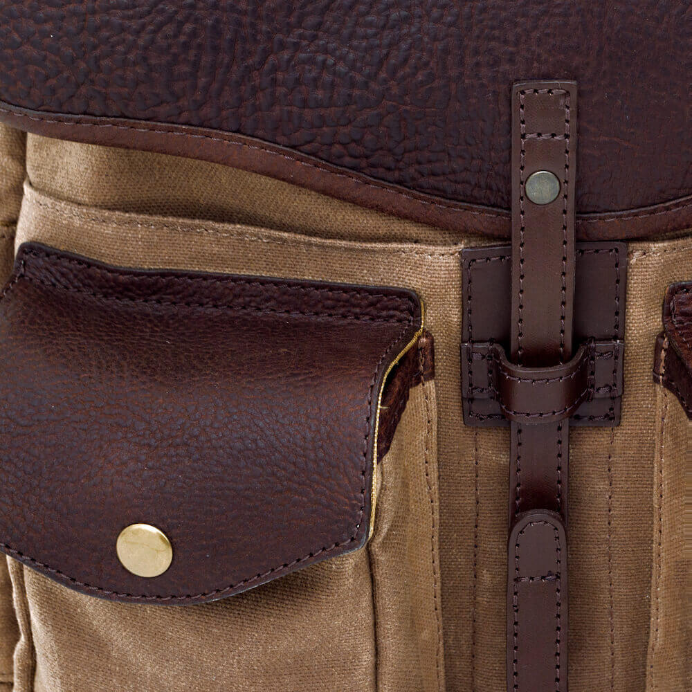 Close up of small pocket on Campaign Waxed Canvas Backpack by Mission Mercantile Leather Goods