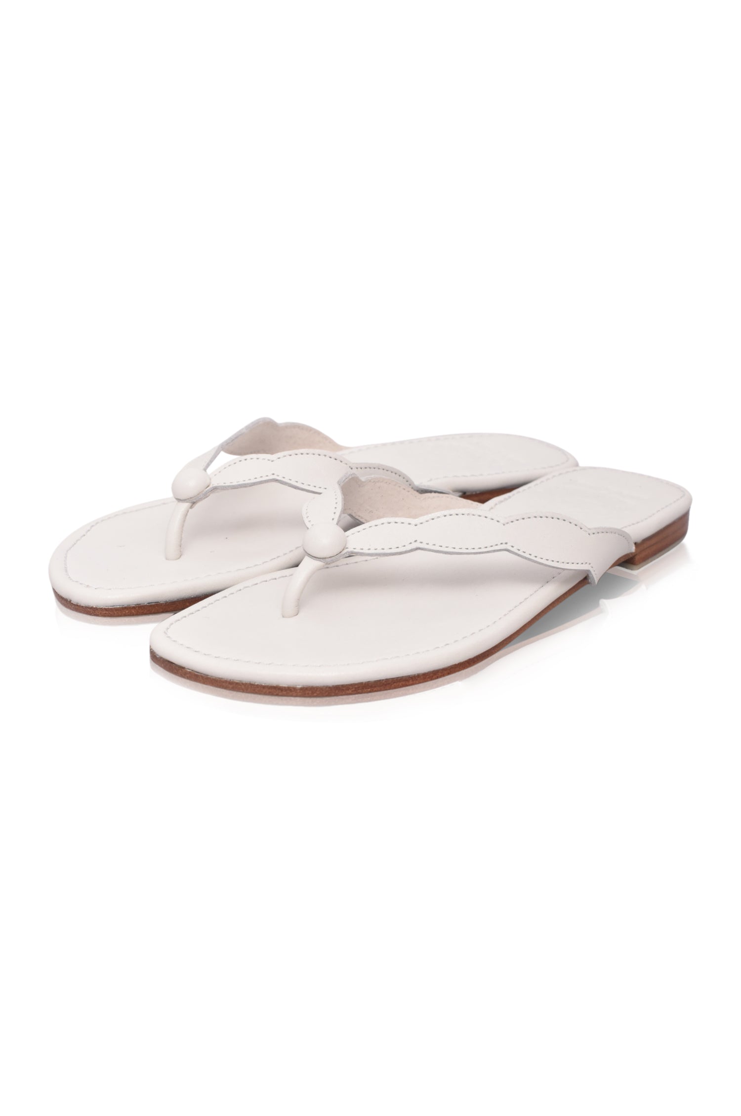 Full view of white Nuvola Thong Leather Slides