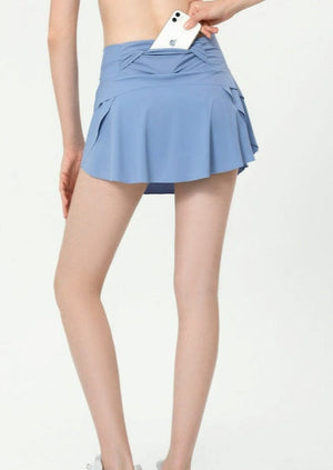Model showing hidden pocket on Ruffled Mini Tennis Skort