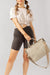 lady carrying the Sloane Tote - Taupe