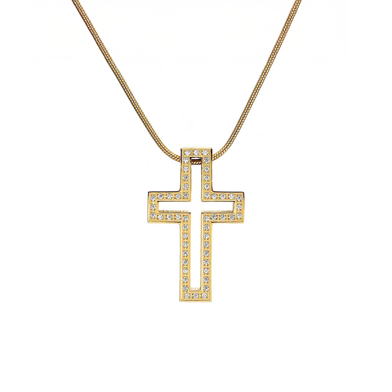 A gold-colored cross pendant with a hollowed design, encircled by a frame set with small, round, clear stones, displayed against a white background.