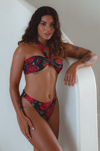 A woman posing in Palmeria Bottom Roses