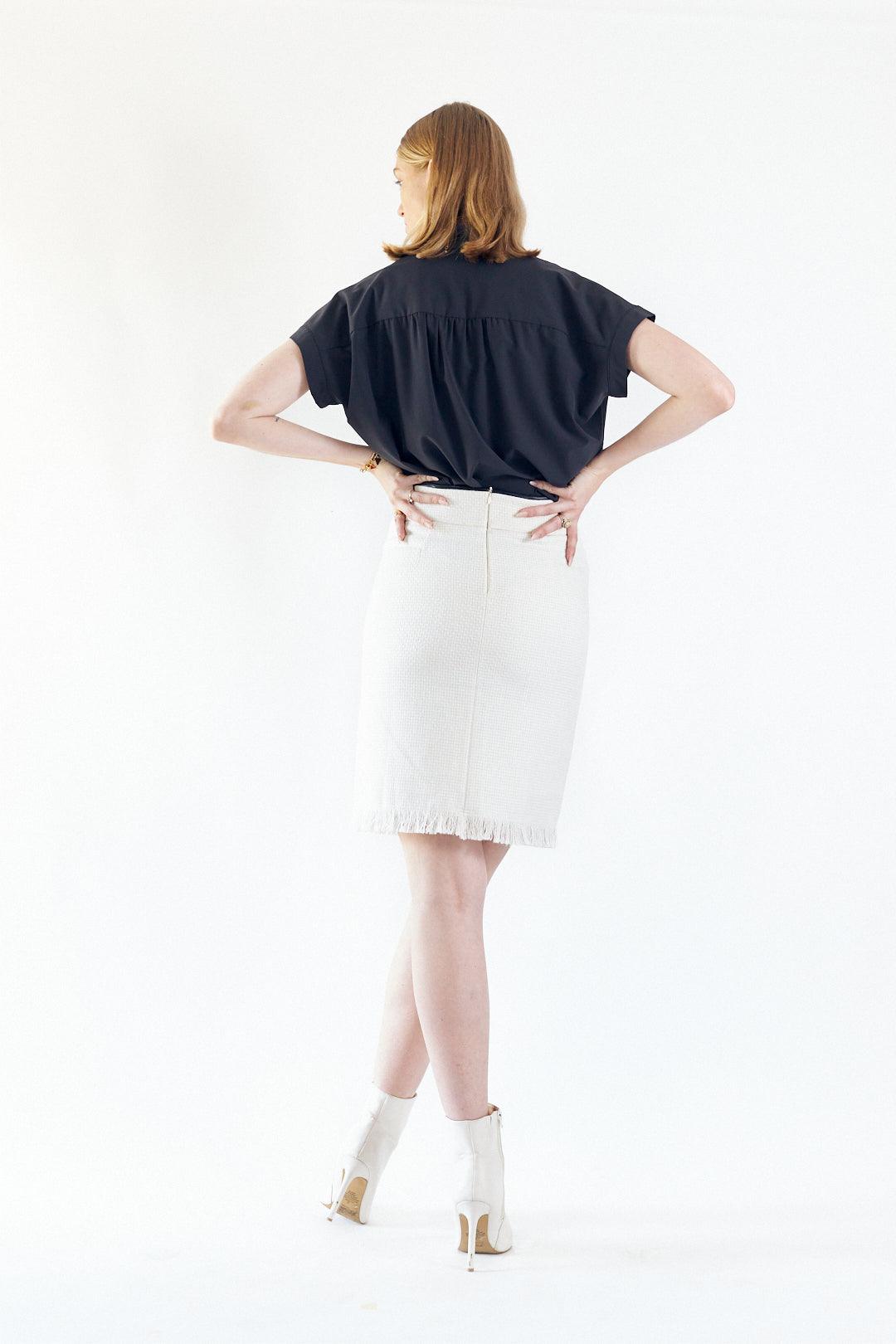 Luxe White Mini Tweed Skirt – A Luxurious Blend of Elegance and Sophistication.