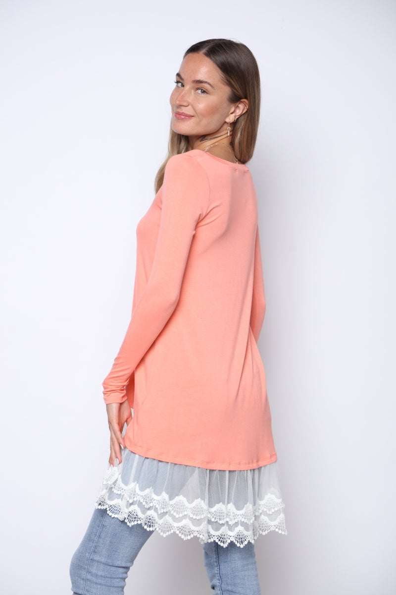 Right side of CANTALOUPE WHITE LACE CONTRAST LONG TUNIC TOP