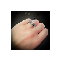Woman wearing  B.Tiff Tension 1 ct Moissanite Round Solitaire Engagement Ring on her finger