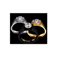 A view of three B.Tiff Tension Black .75 ct Round Solitaire Engagement Ring