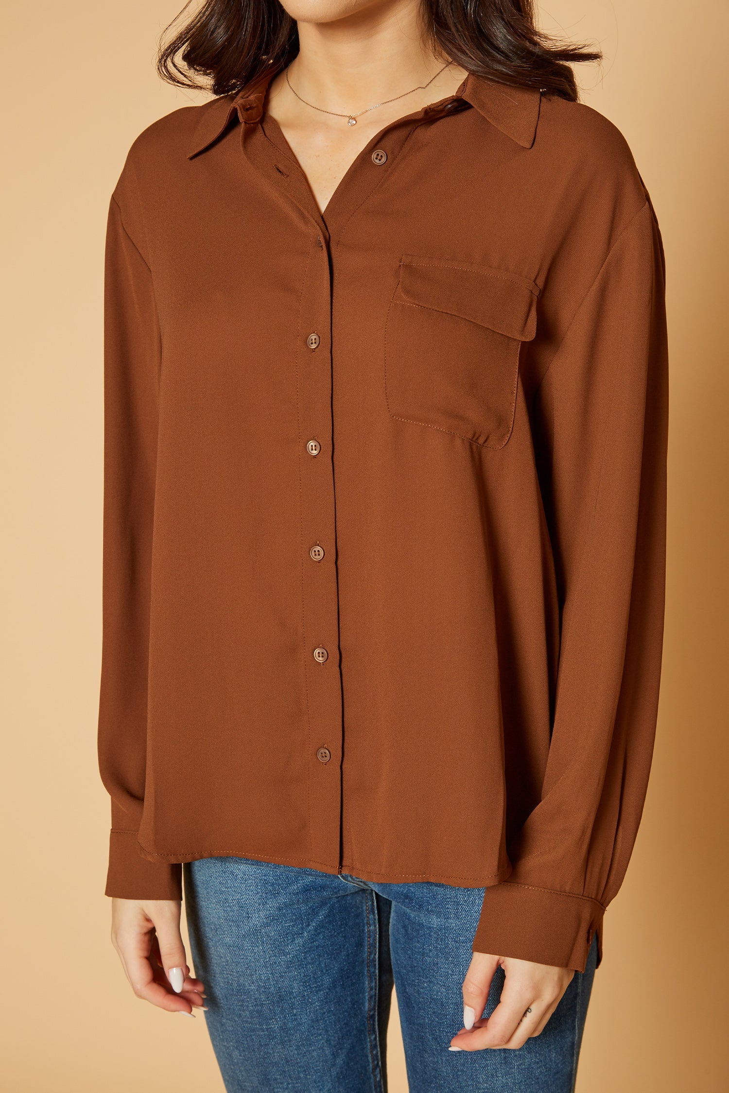 Pleione Women's Solid Low Back Button Shirt in Brown