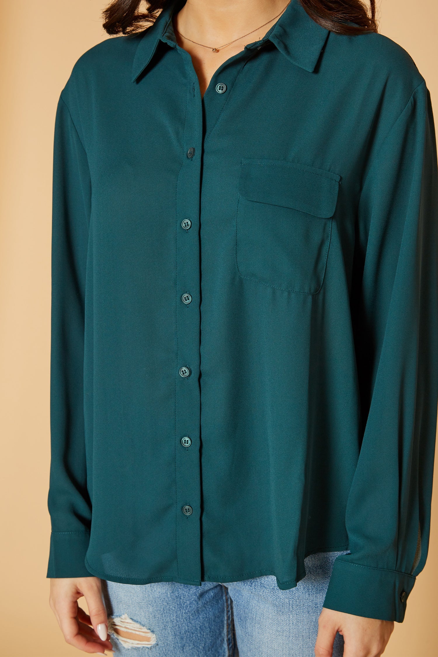 Pleione Women's Solid Low Back Button Shirt in Green